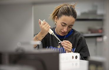 student in genetics lab