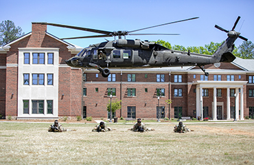 ROTC students with Black Hawk helicopter