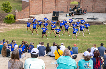 cheerleaders perform at Family Day