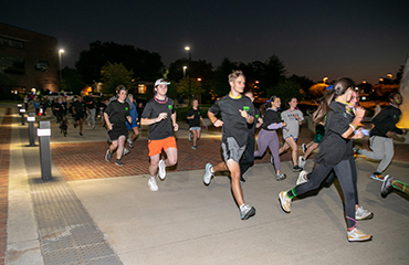 students running in Moonshine Run event