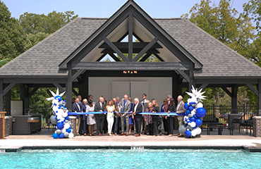 ribbon cutting at pool