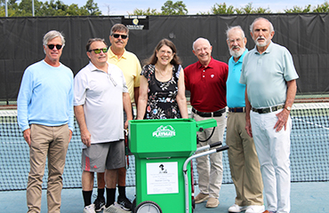 tennis group with donation