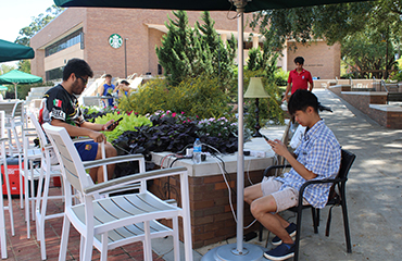 students charging phones