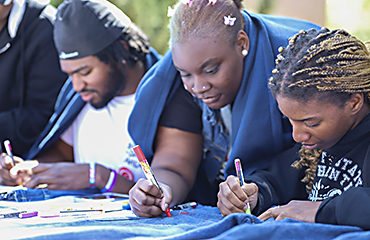 students writing support messages