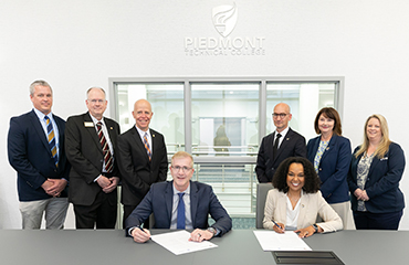 officials signing agreement