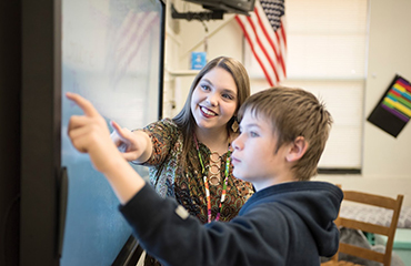 student teacher with child