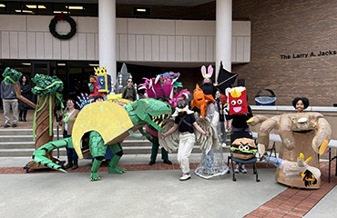 students with puppets